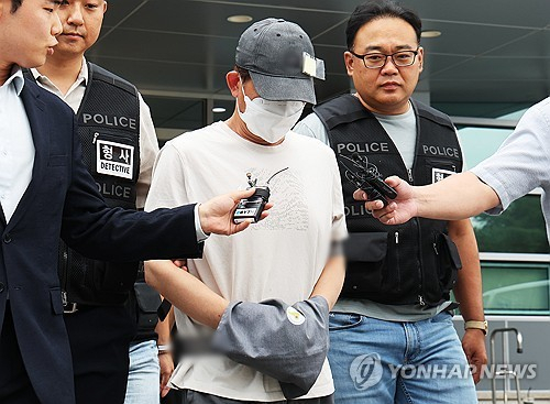 ◇20대 여성 틱토커를 살해하고 시신을 유기한 혐의로 재판에 넘겨진 50대 남성 [연합뉴스 자료사진]