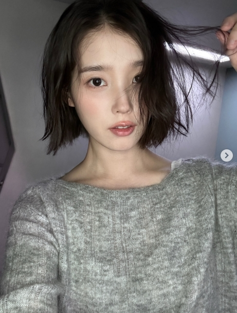 IU Drops MV Shoot Photos for First Single in a Year, and the Bob Is Doing a Lot