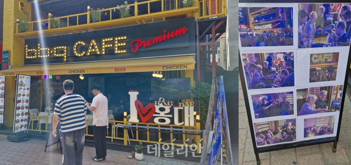 시민들이 젠슨 황 엔비디아 최고경영자(CEO)와 국내 대기업 총수들이 지난 5일 2차 '치맥 회동'을 위해 방문한 BBQ 홍대입구점 앞에 비치된 사진을 휴대전화로 촬영하고 있다.이날 제너시스BBQ 그룹에 따르면 홍