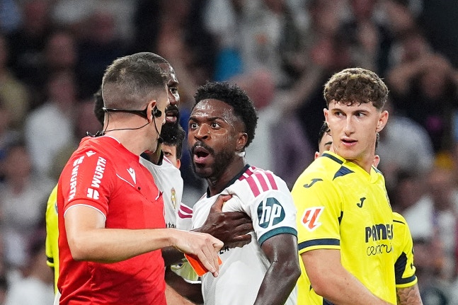 MADRID, SPAIN - OCTOBER 10: Vinicius Junior of Real Madrid receives a red card from referee Isidro Diaz de Mera Escuderos during the LaLiga EA Sports 2026/27 match between Real Madrid and Villarreal CF at Estadio Santiago Bernabeu on October 10, 2026 in Madrid, Spain. (Photo by Angel Martinez/Getty