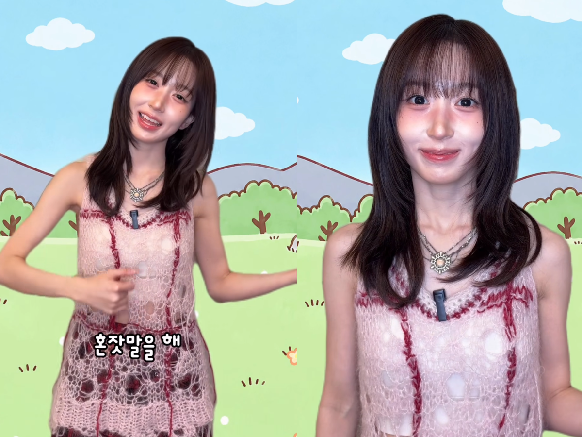 mmmマガジンの動画で、ピンクのニット姿でカメラに向かって歌うNMIXXヘウォン
