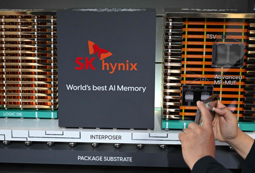  A visitor takes a picture of a model of SK hynix's high-bandwidth memory (HBM) technology during the 2025 World IT Show