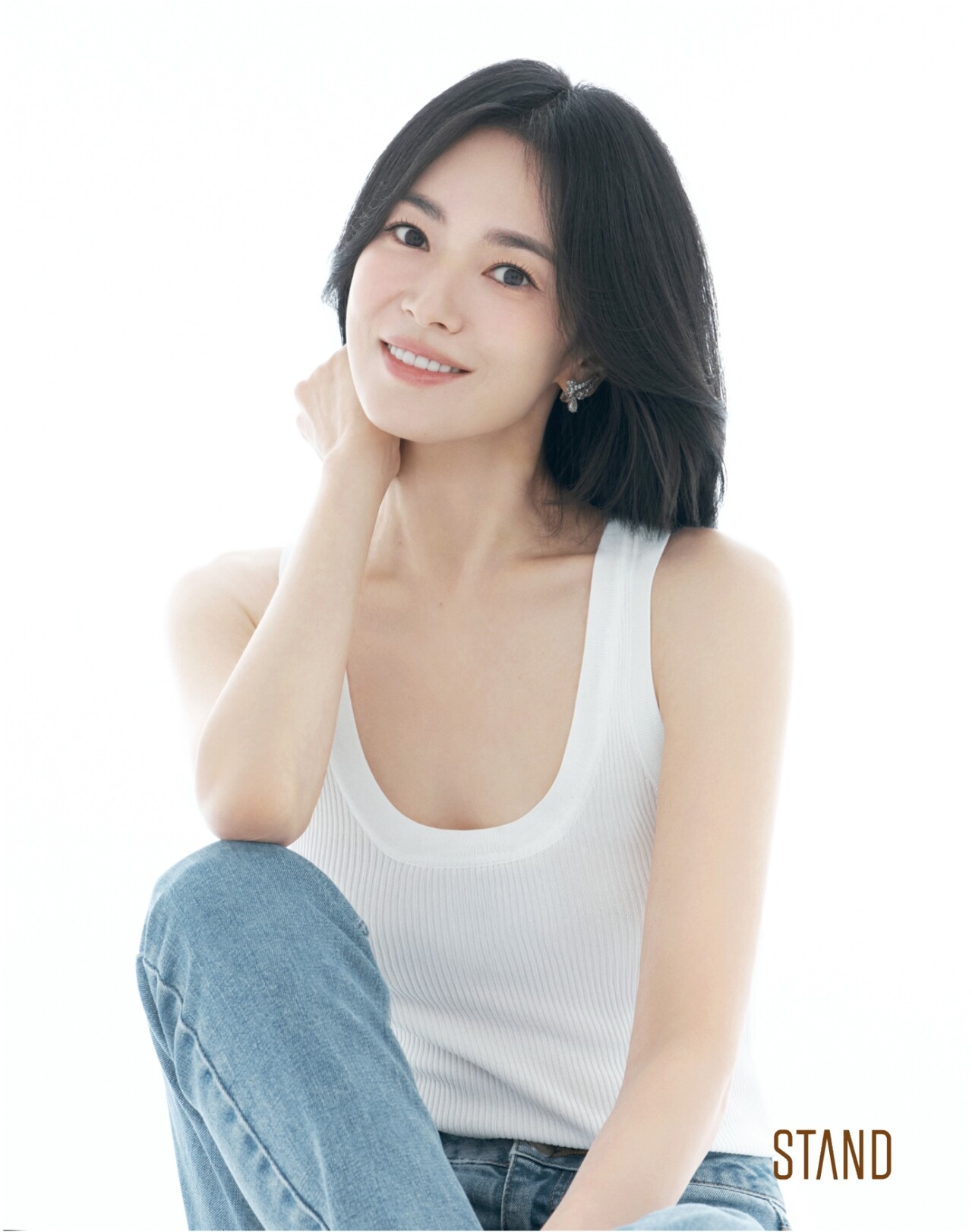 Song Hye-Kyo Joins STAND After 30 Years, and Her Sleeveless Profile Photo Divides Opinion