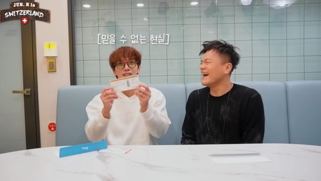 Park Jin-young gave Jun. K a 'flight ticket to Switzerland' to celebrate his 20th anniversary with JYP!!!