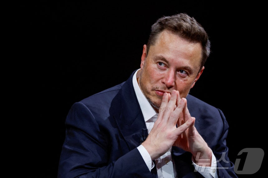 일론 머스크가 지난달 16일(현지시간) 프랑스 파리에서 열린 비바 테크놀로지 컨퍼런스에서 생각에 잠겨있다.2025.6.16 ⓒ 로이터=뉴스1 ⓒ News1 김경민 기자