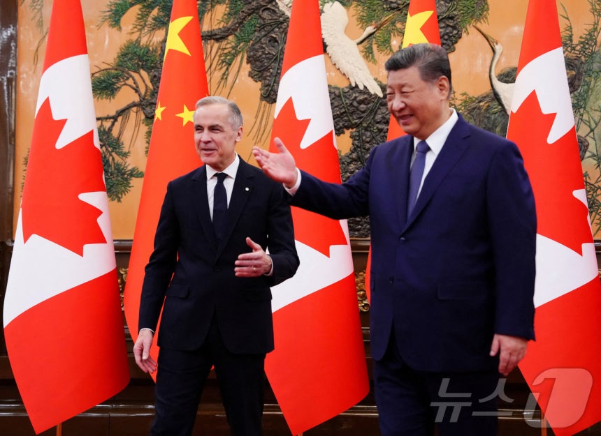 베이징에서 만난 마크 카니 캐나다 총리(왼쪽)과 시진핑 중국 국가주석.2026.01.16 ⓒ 로이터=뉴스1 ⓒ News1 이지예 객원기자
