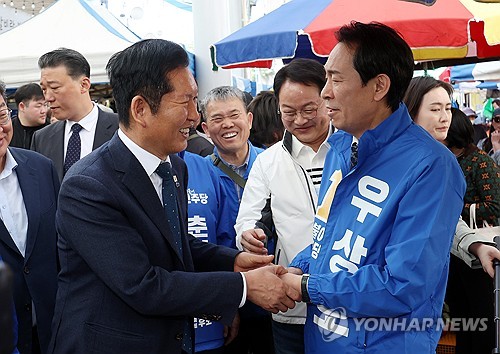 우상호 지원사격 나선 정청래 대표 [연합뉴스 제공]