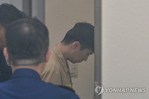 1심 선고공판 출석하는 장윤기 [연합뉴스 자료사진]