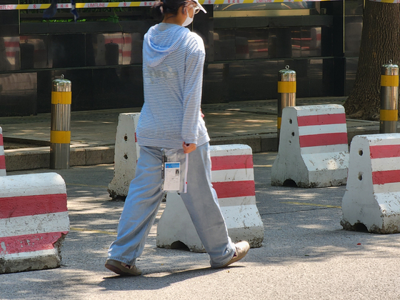 8月8日，一名候選人正在進入北京技術大學的高中，在那裡舉行了中國大學入學考試的Kaokao。通訊員李do -Sung。