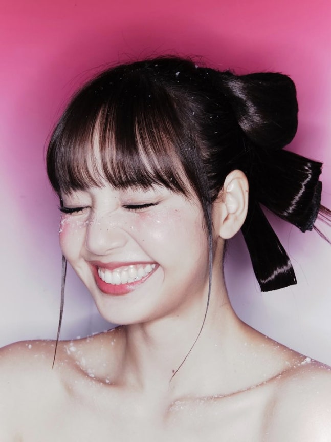 Close-up detail of pink ribbon corset top structure