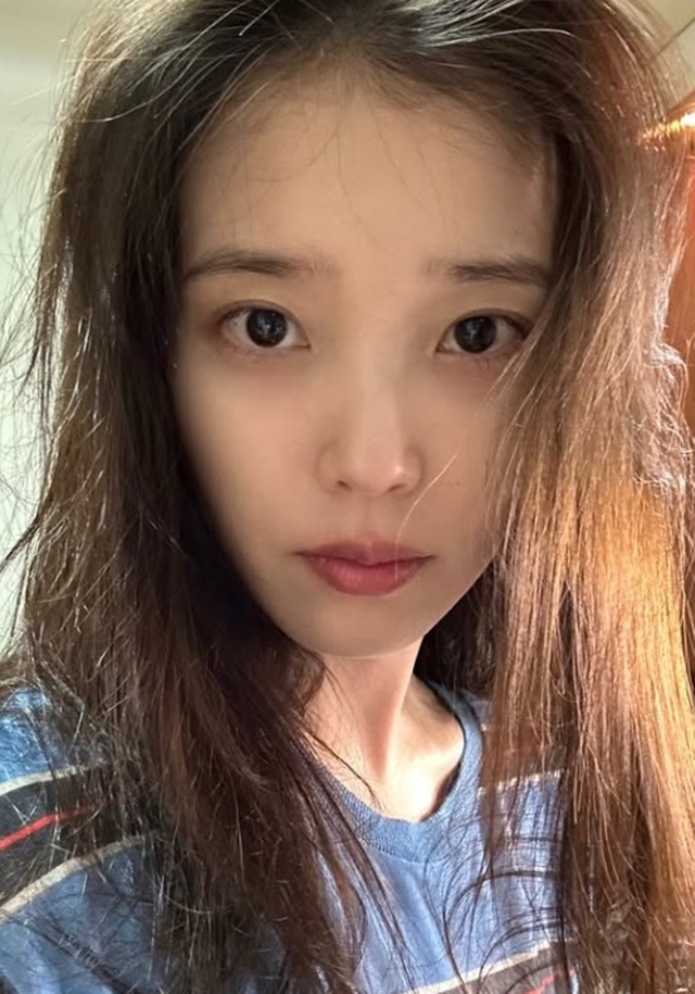 Was IU's Song Choice on SNS a Coincidence? Fans Are Split After She Used Ex Jang Kiha's Track