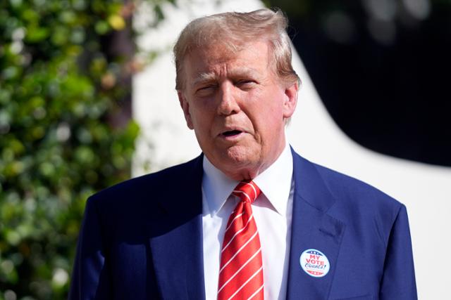 Former US President Donald Trump speaks to reporters after finishing the primary vote in Palm Beach, Florida on March 19. Palm Beach=AP News