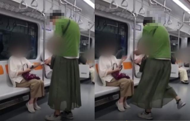 지난 11일 오후 10시쯤 지하철 3호선 오금행 열차에서 긴 치마를 입은 남성이 중년 여성의 돈을 빼앗고 있다. JTBC '사건반장' 캡처