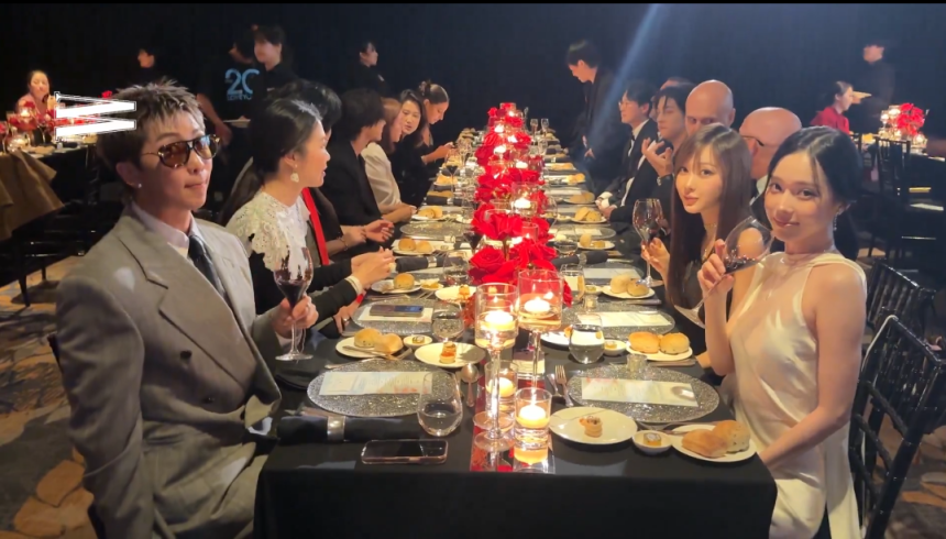 15일 서울 중구 포시즌스호텔에서 열린 W코리아의 '유방암 인식 개선 자선행사' 도중 BTS 멤버 RM(왼쪽 맨앞)과 에스파 멤버 윈터(오른쪽 맨앞)가 카메라를 응시하고 있다. W코라이 인스타그램 캡처