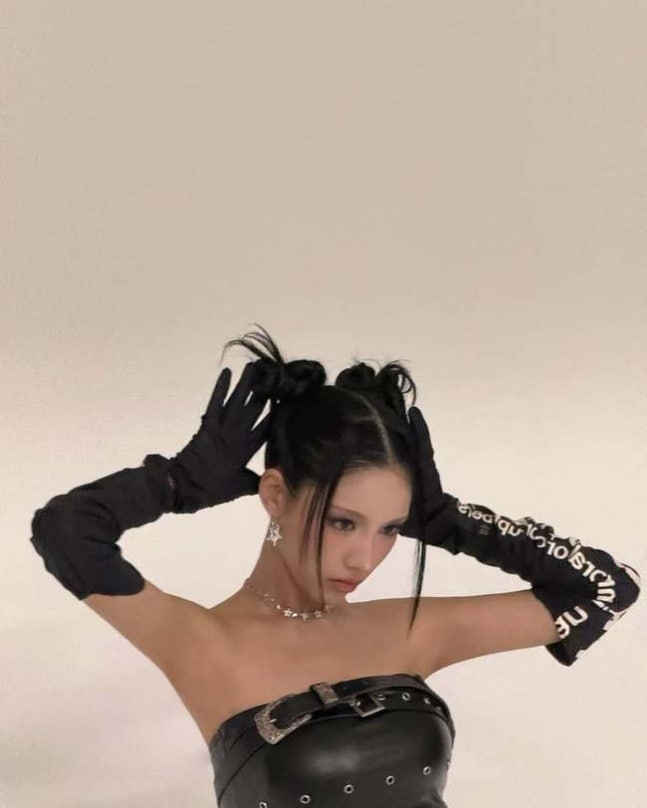 Chowon in editorial pose with jewelry styling showcasing professional campaign aesthetic