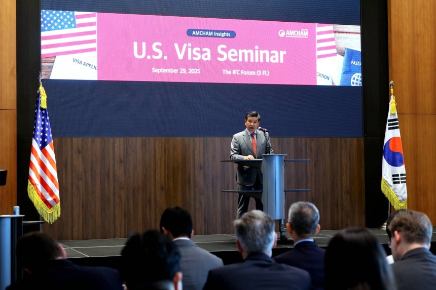 James Kim, CEO and chairman of the American Chamber of Commerce in Korea, speaks during a seminar ho