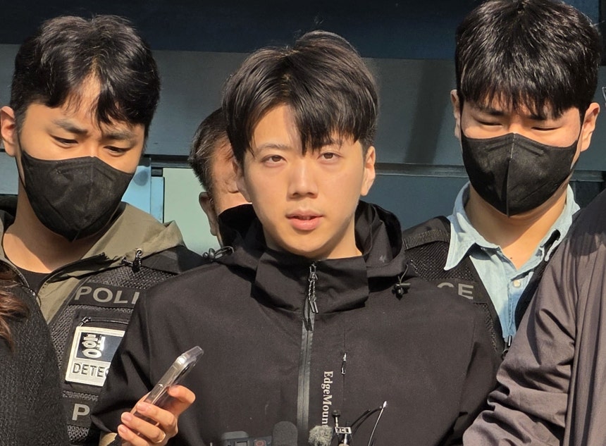 Jang Yun-gi, who is accused of fatally stabbing a high school girl he did not know in downtown Gwangju on Children's Day