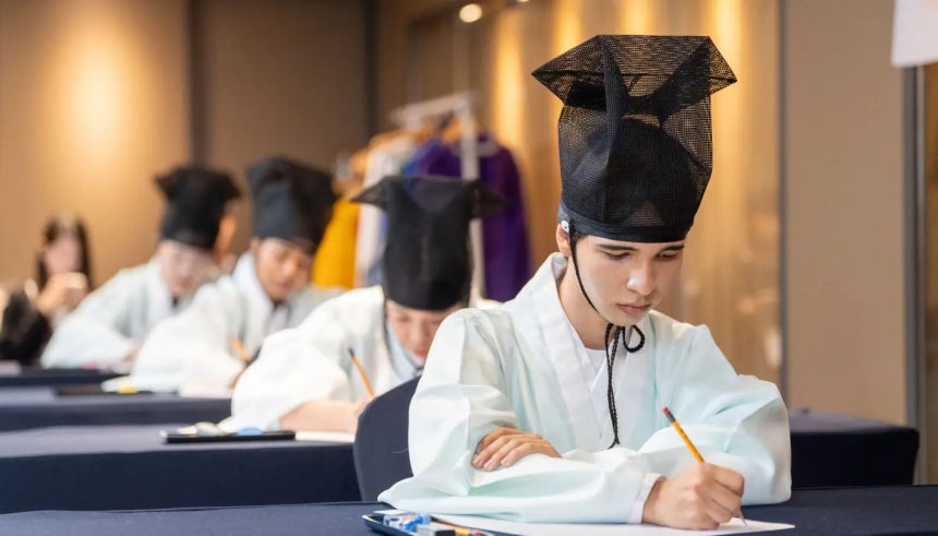 Contestants engage in a writing contest as part of the King Sejong Institute Foundation’s annual training program on Oct