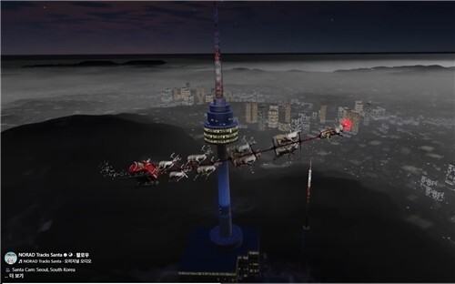 남산타워 근처 공중을 지나가는 산타 썰매.페이스북 NORAD Tracks Santa 공개 영상 캡처